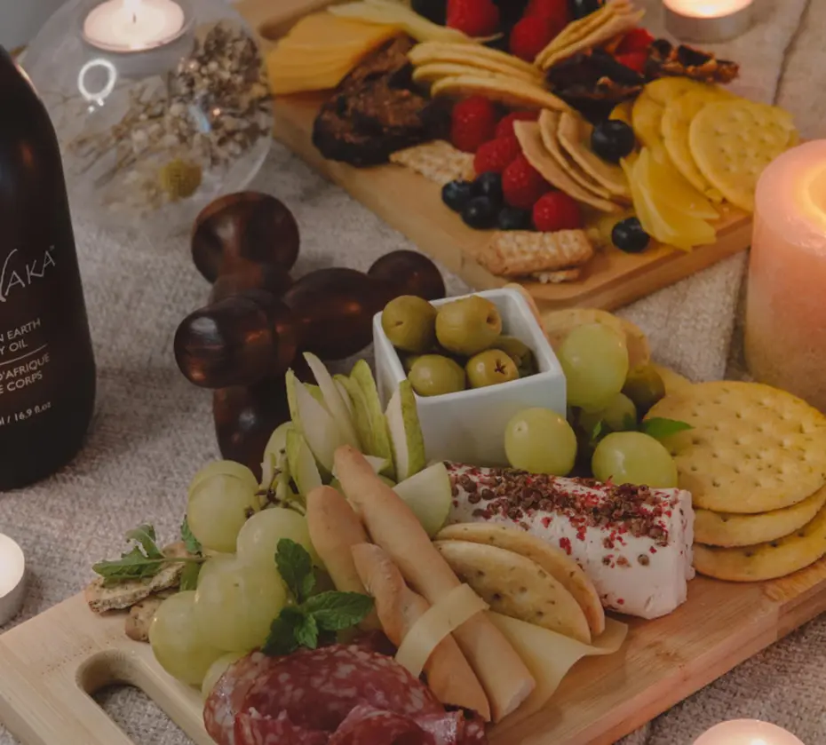 TheraNaka skincare products on a wooden table at Pause Spa