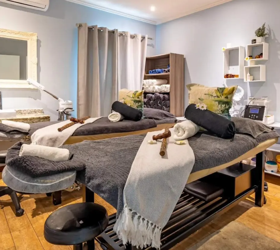 Massage beds inside a treatment room at Pause Spa